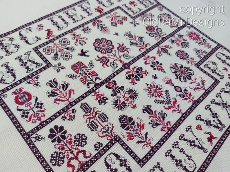 picture of the red cross stitch sampler Ref 069 Blooming CloRaMi Sampler