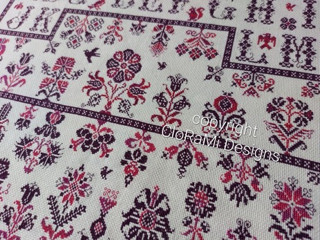 picture of the red crossstitch sampler Ref 069 Blooming CloRaMi Sampler