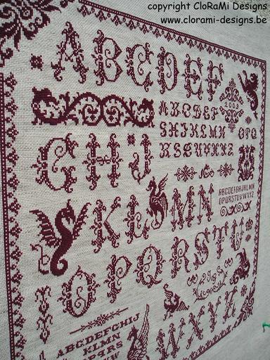 picture of the red cross stitch sampler Ref 061 Dragon Sampler