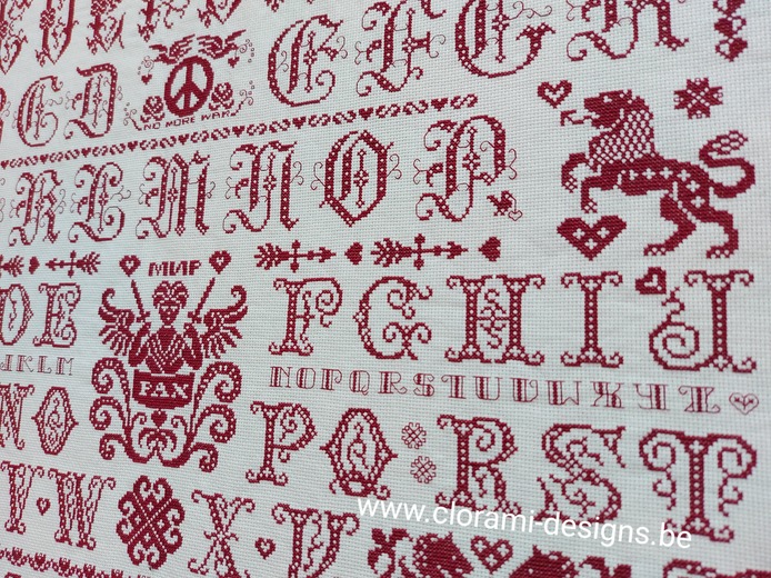 picture of the red cross-stitch sampler Ref 070 Peace Sampler