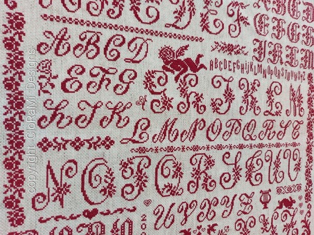 image du marquoir rouge au point de croix Ref 068 Petits Croix Romantiques